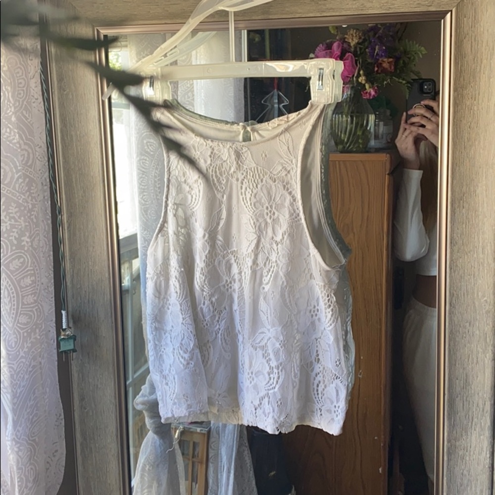 White lace-patterned crop top